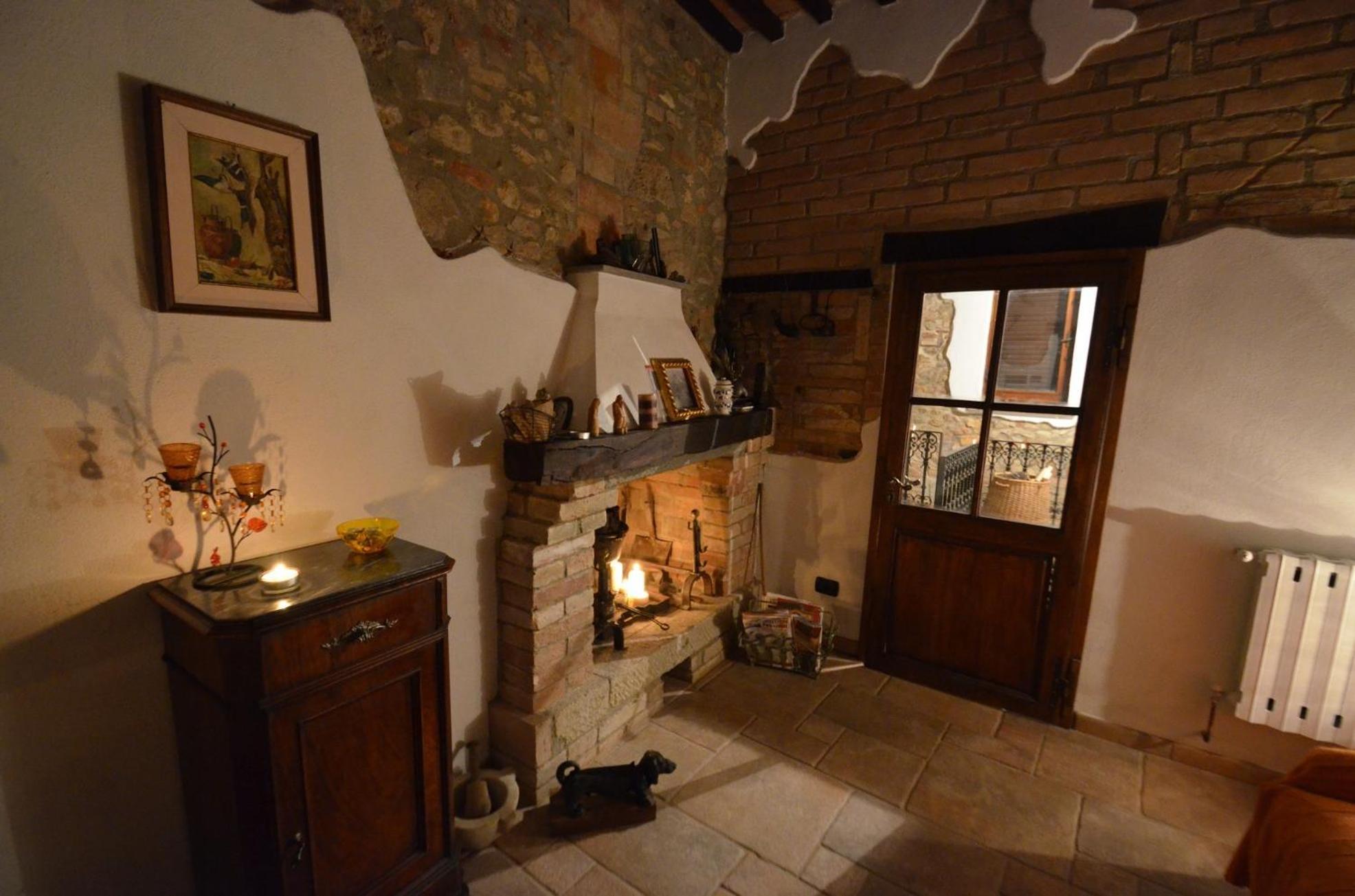 Appartement La Divina Dimora Il Castello Degli Spiriti Magni à Montepescali Chambre photo