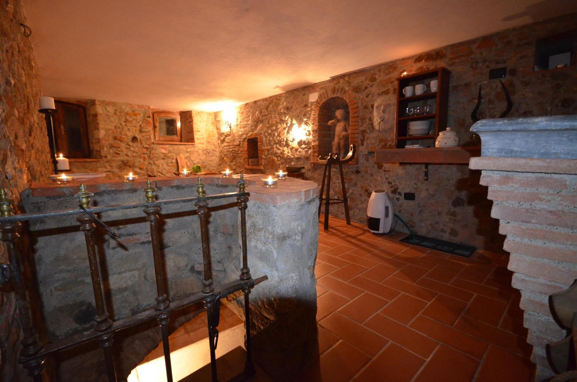 Appartement La Divina Dimora Il Castello Degli Spiriti Magni à Montepescali Chambre photo