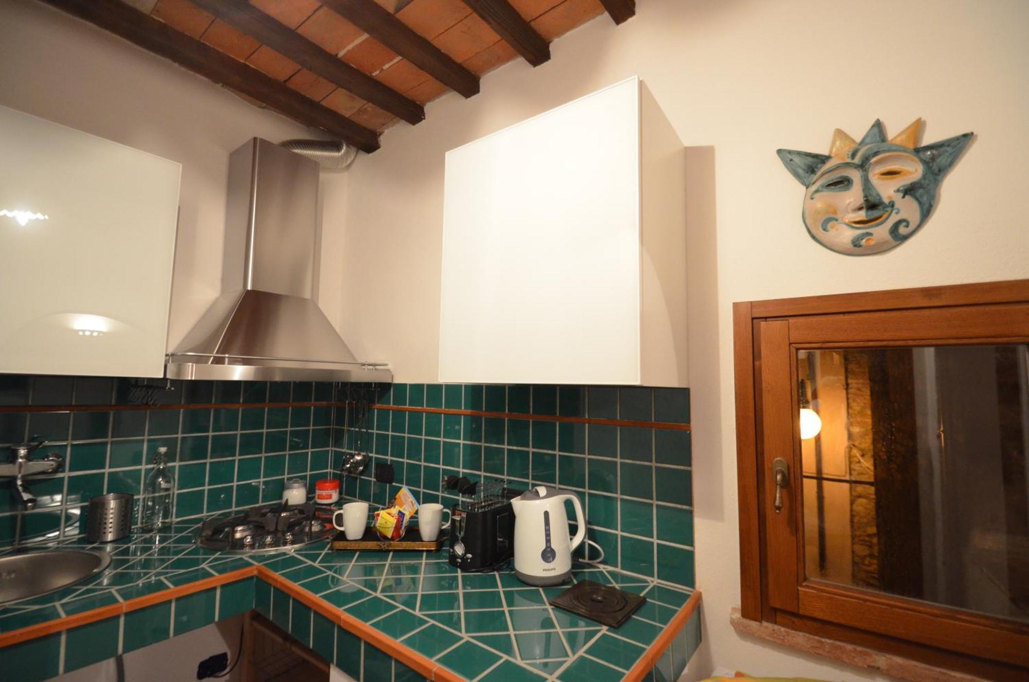 Appartement La Divina Dimora Il Castello Degli Spiriti Magni à Montepescali Chambre photo